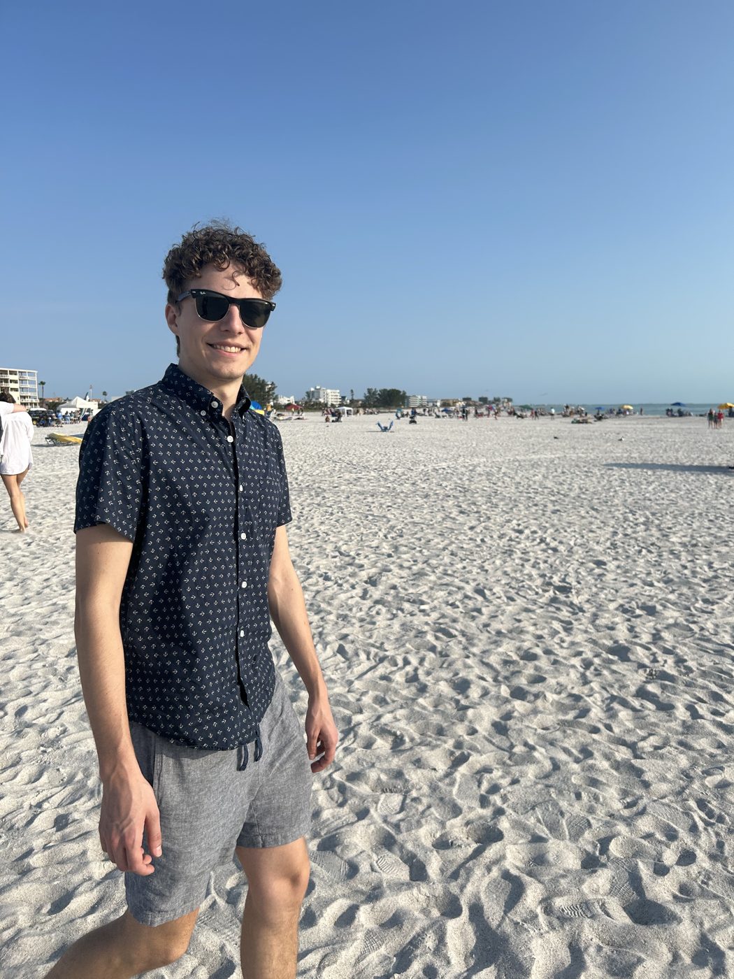 Standing on the beach on a sunny day